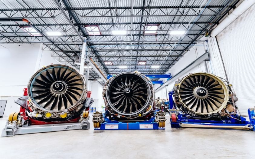 Three jet engines on stands. Willis has purchased, leased and sold more engines in more countries than any independent competitor.